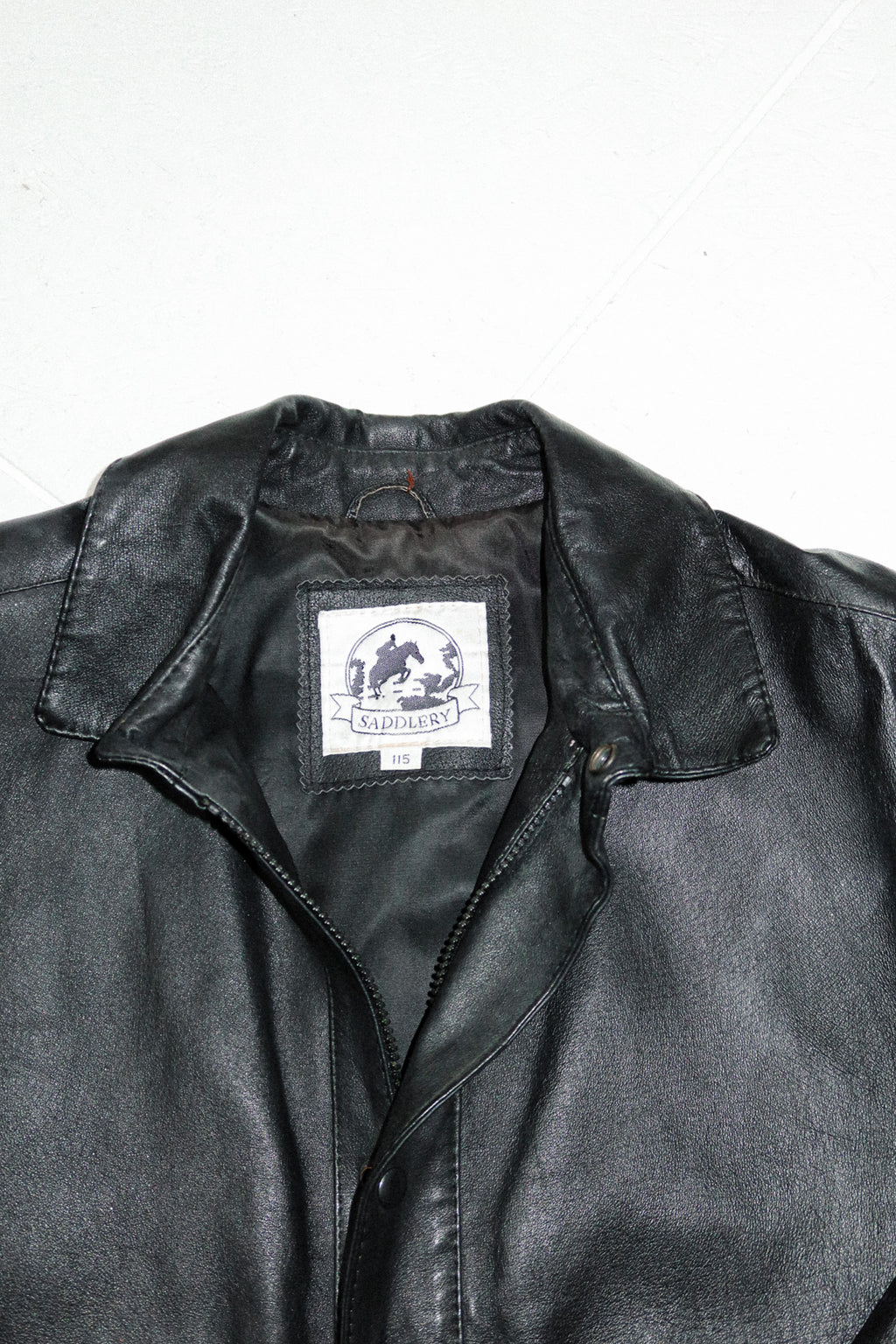 saddlery leather bomber jacket black.