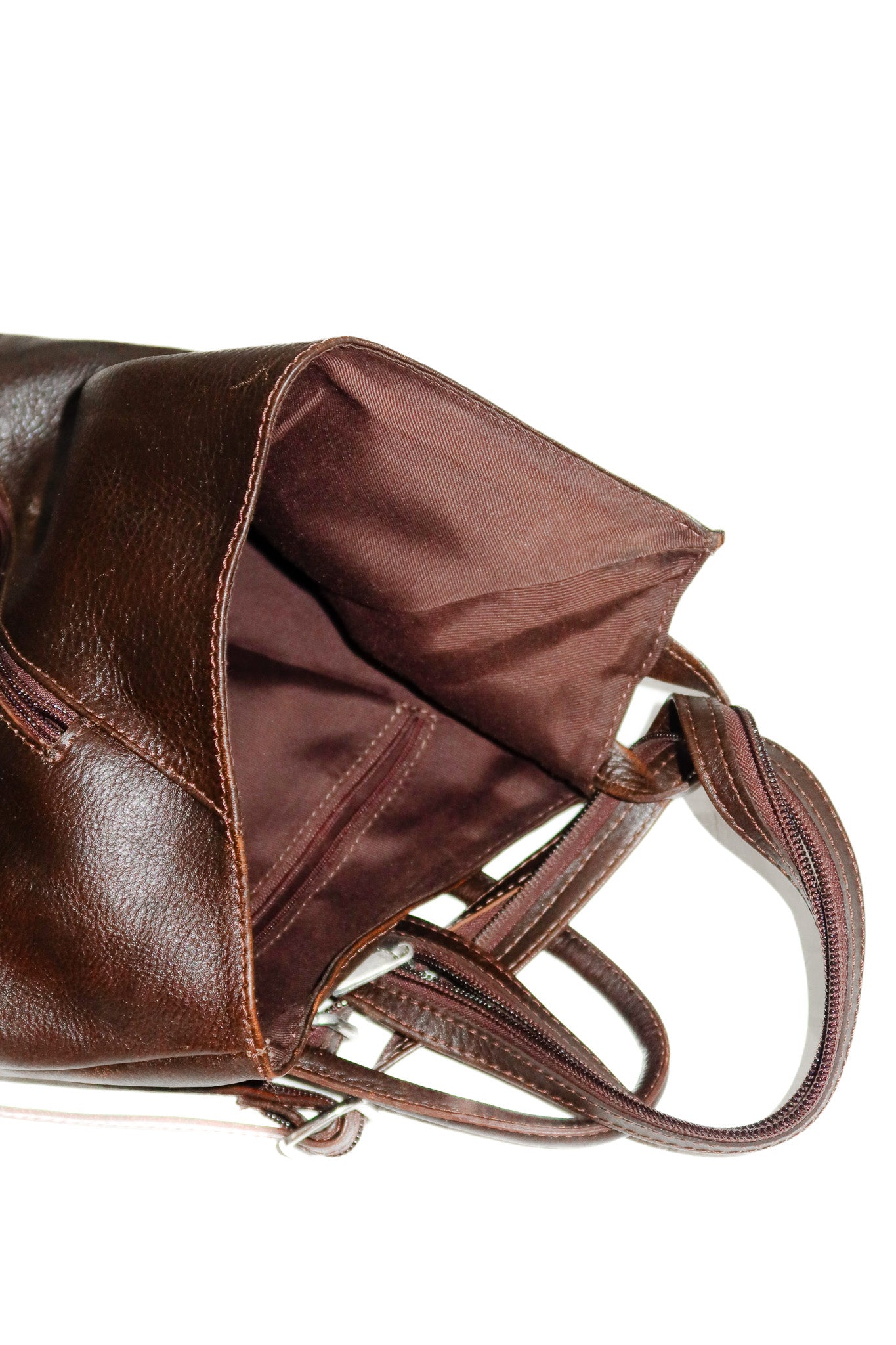 unsigned italian leather mini backpack dark brown.