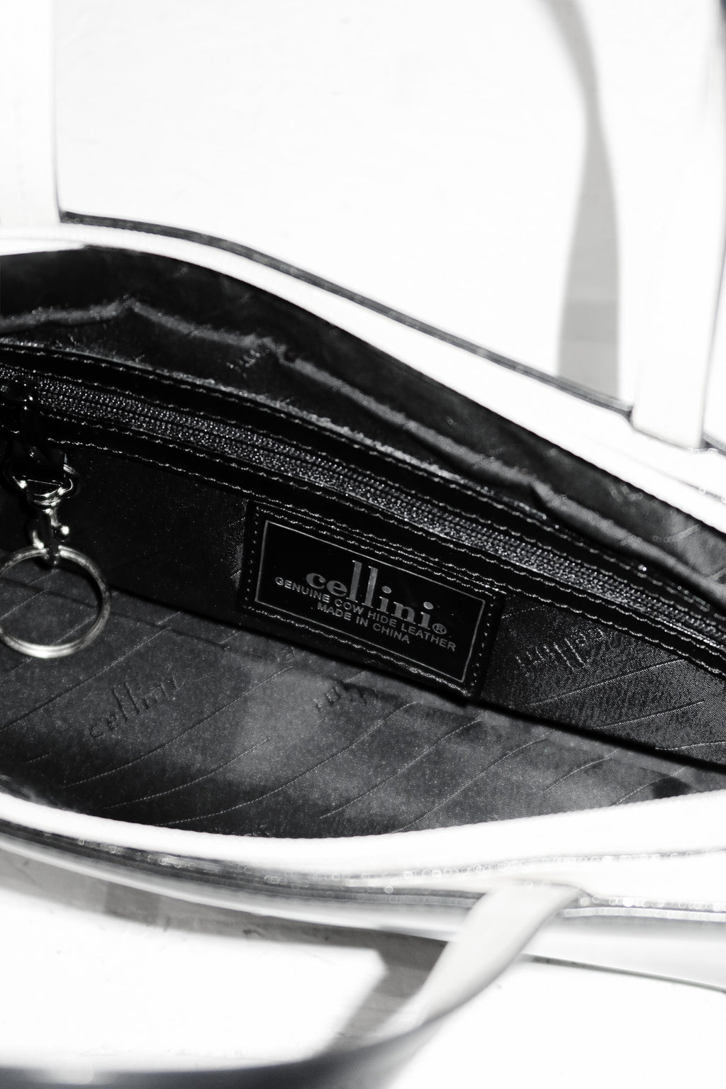 cellini leather top handle bag black/cream.