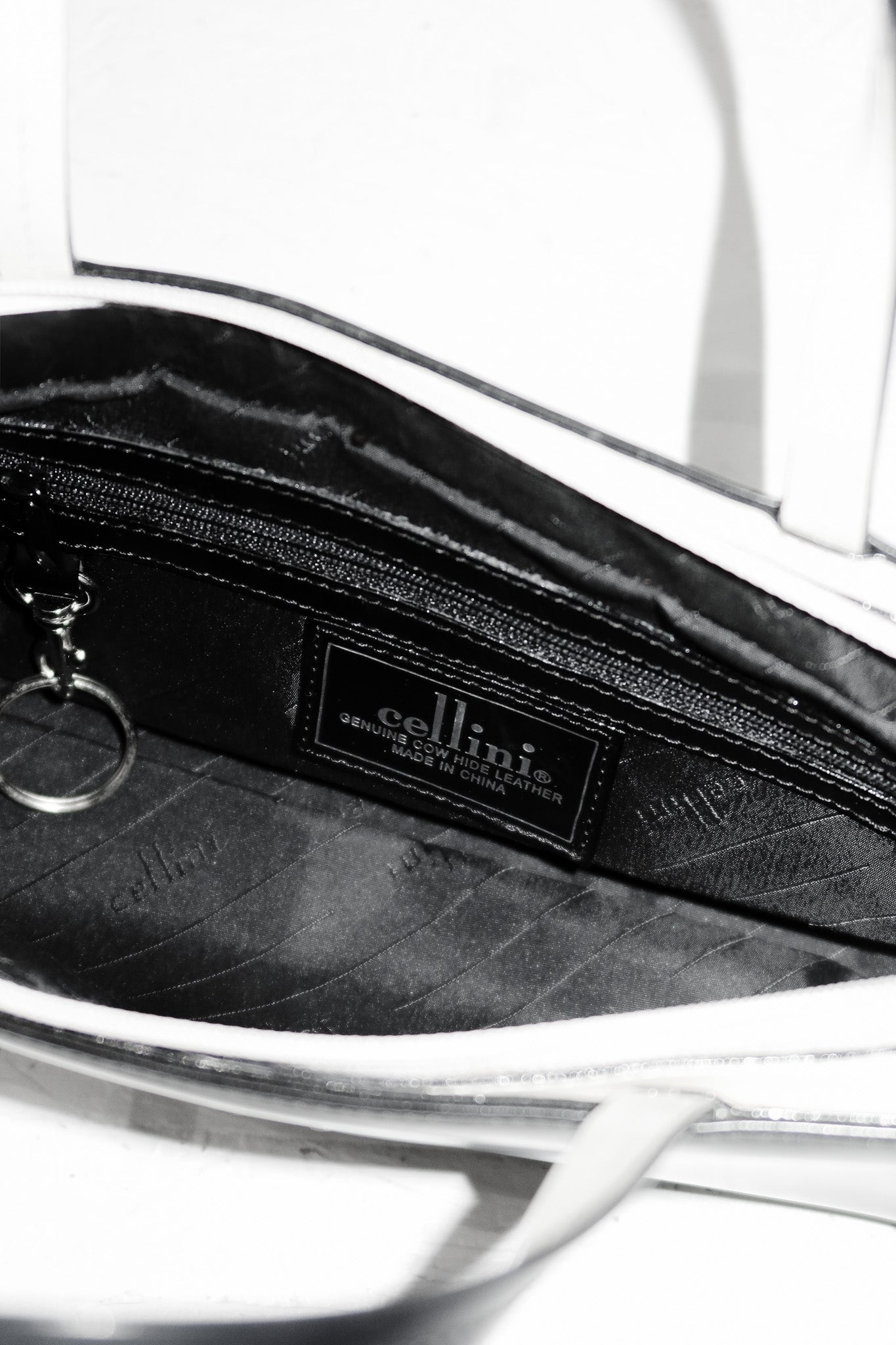 cellini leather top handle bag black/cream.