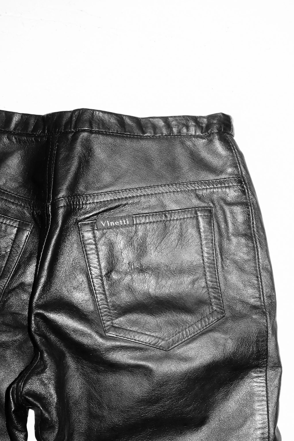 vinetti leather low-rise flared pants black.
