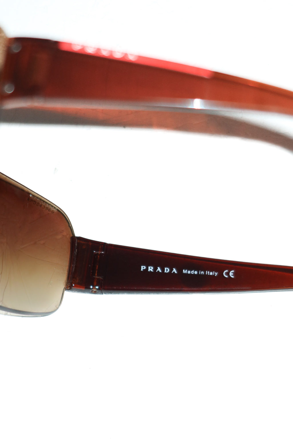 prada linea rossa rimless sunglasses brown.