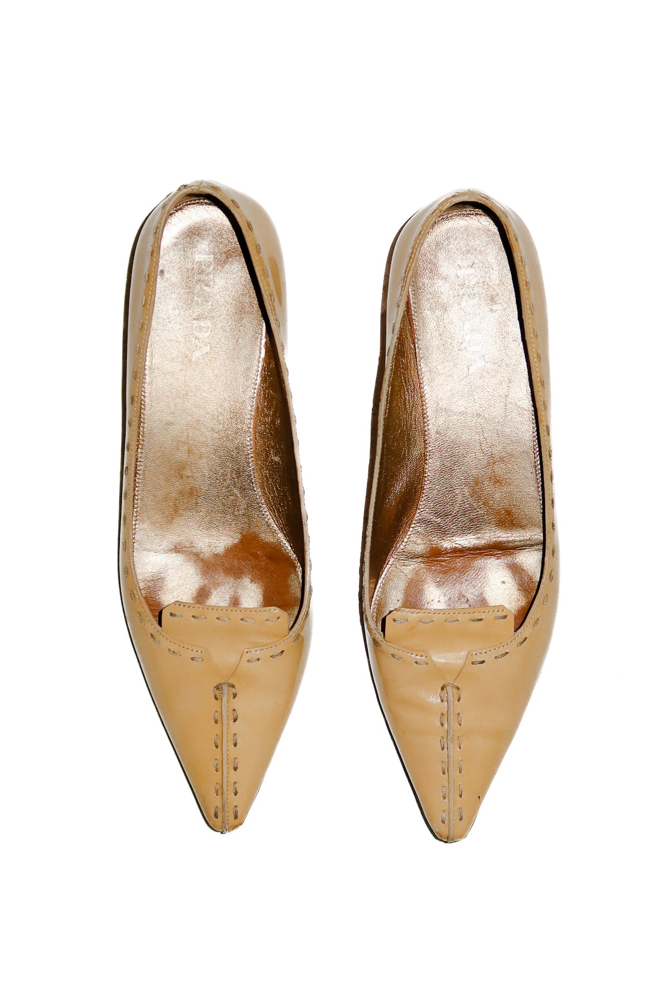 prada patent leather kitten heel cream.