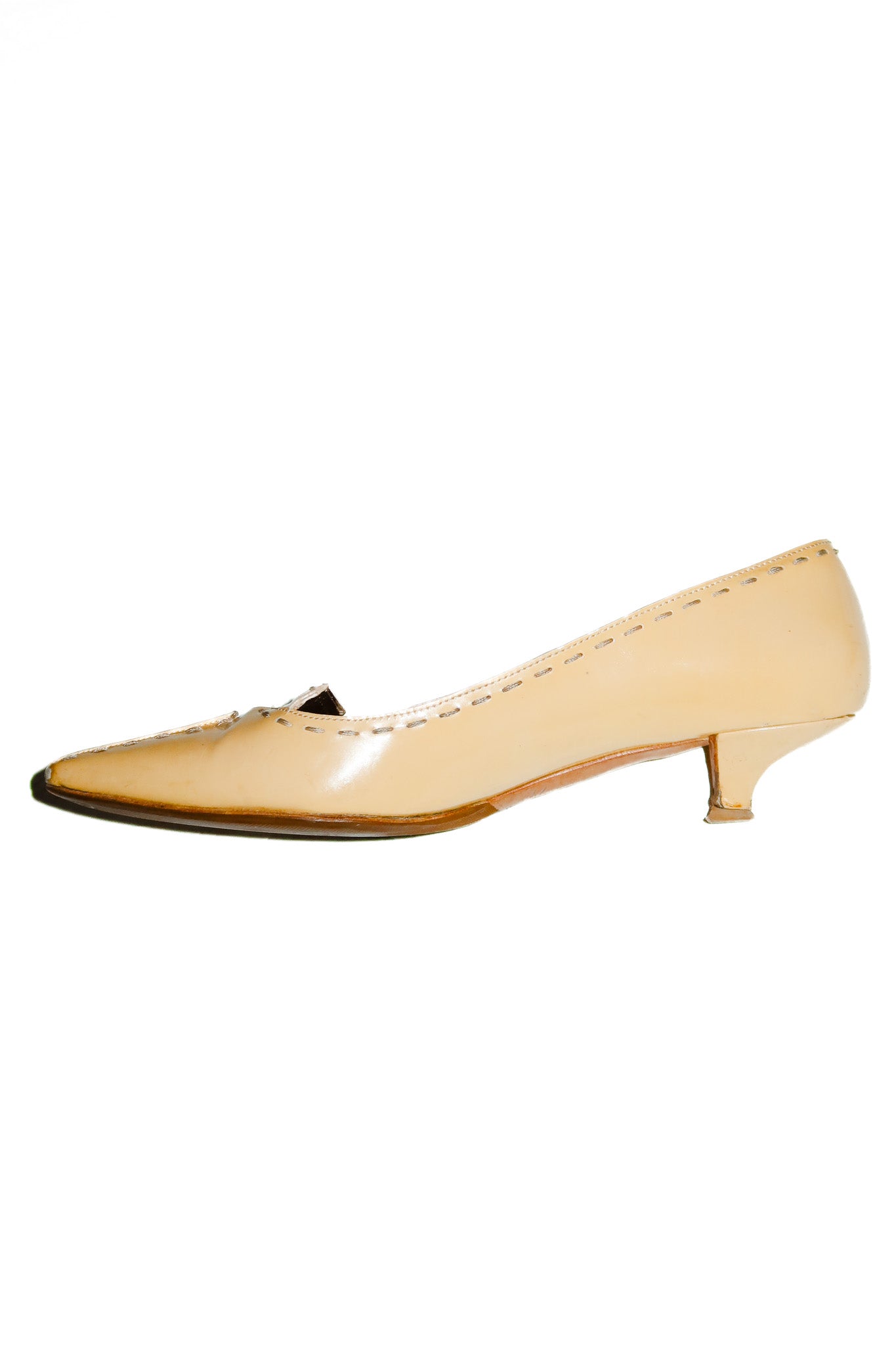 prada patent leather kitten heel cream.