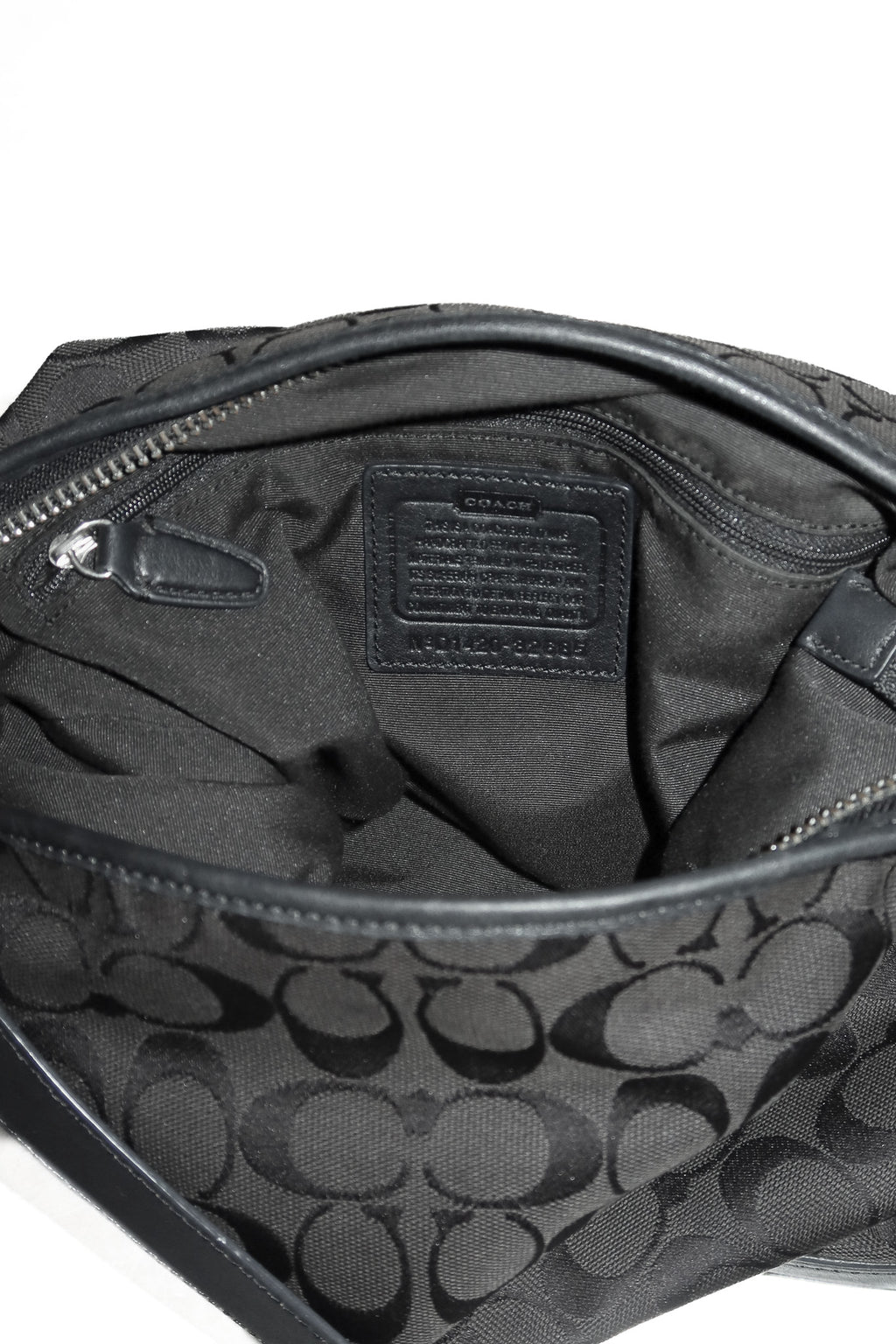 coach canvas / leather legacy duffle bag black.