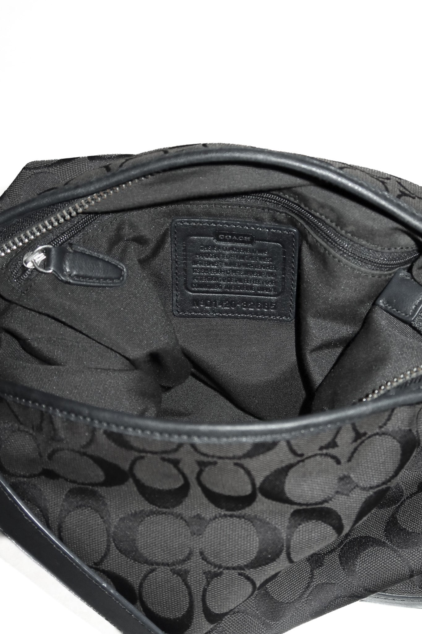 coach canvas / leather legacy duffle bag black.