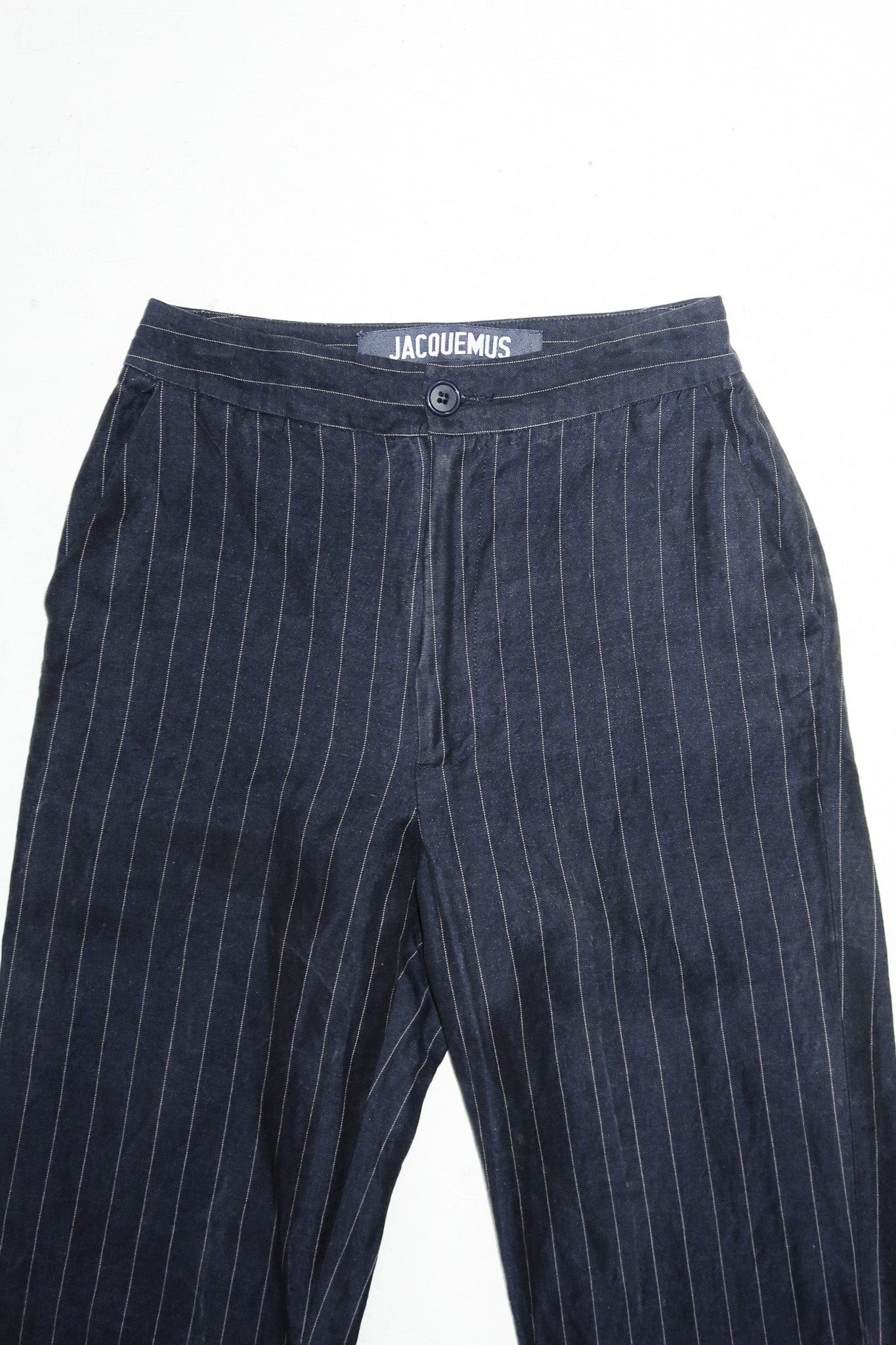 jacquemus valérie pinstripe split hem trousers navy.