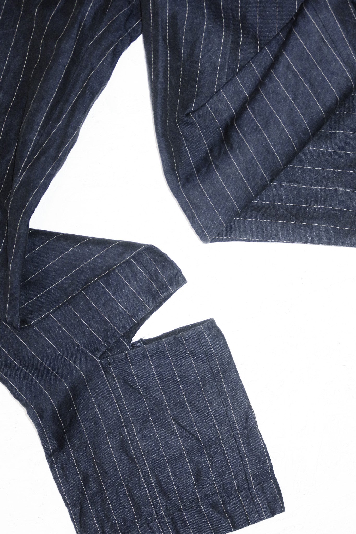 jacquemus valérie pinstripe split hem trousers navy.