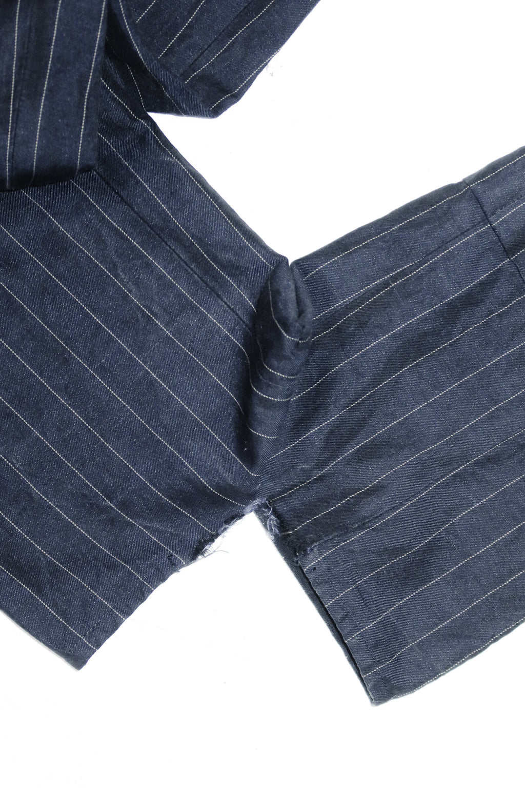 jacquemus valérie pinstripe split hem trousers navy.