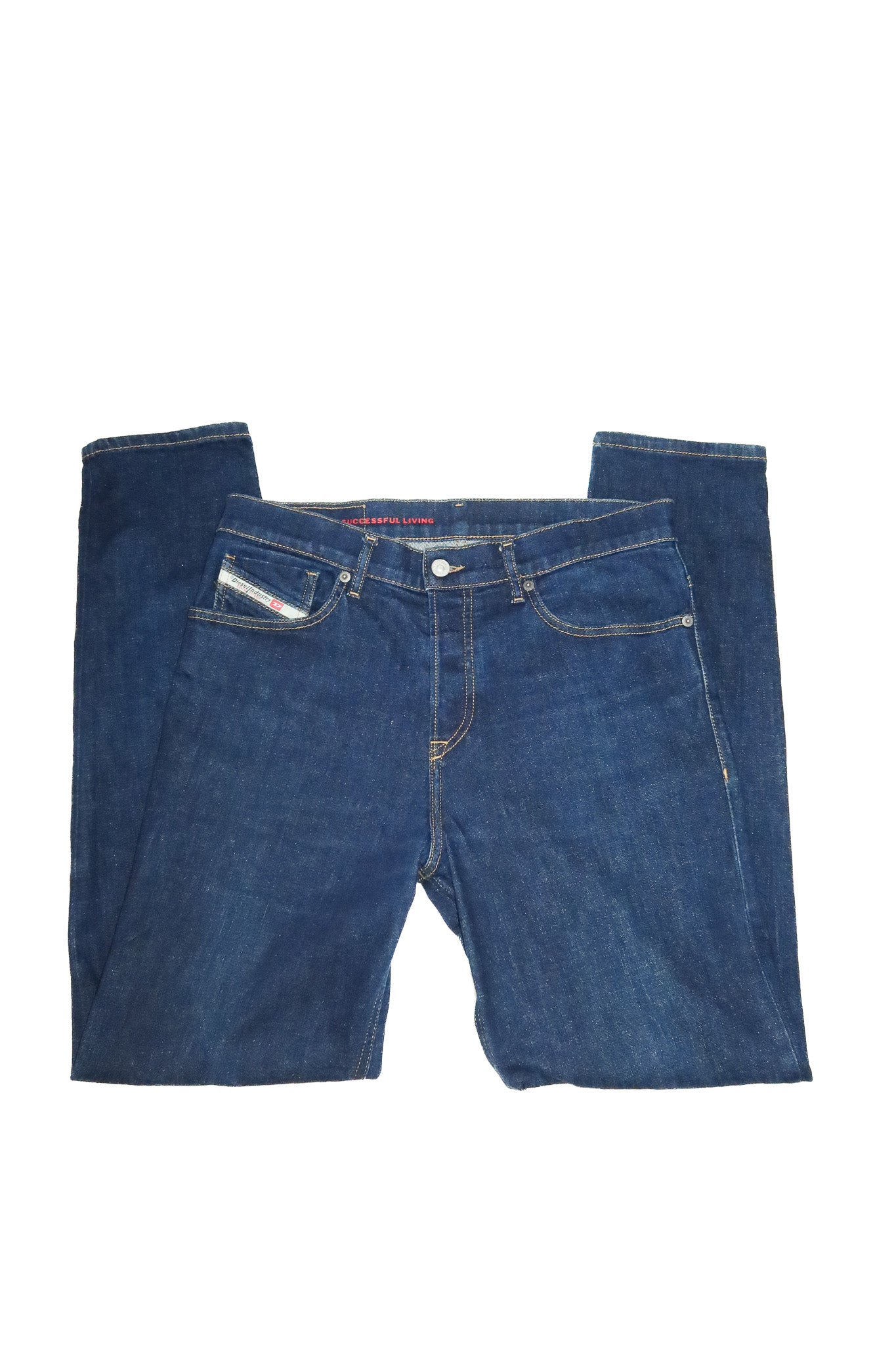 2010’s diesel library tapered jeans dark washed blue.
