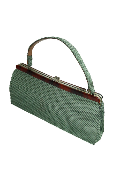 1960's unsigned patterned fabric tort frame handbag green.