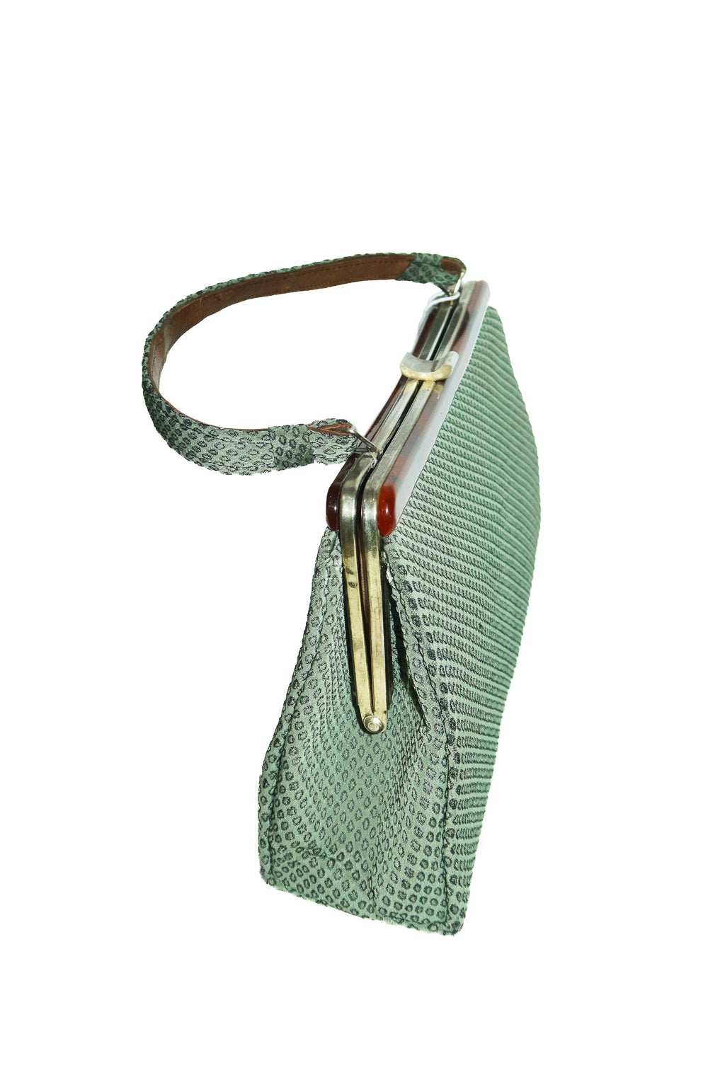 1960's unsigned patterned fabric tort frame handbag green.