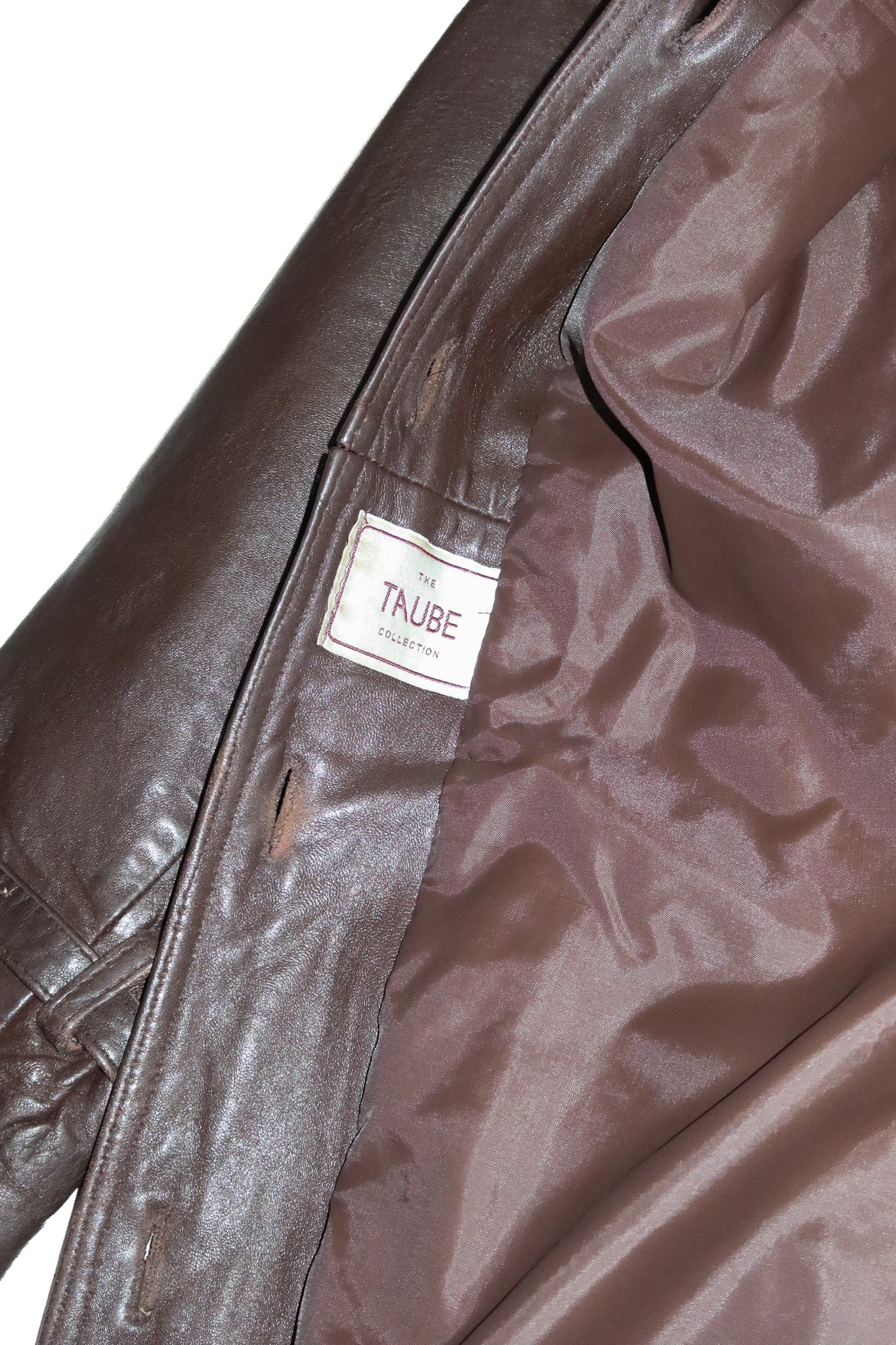 1980’s taube collection leather trench coat brown.