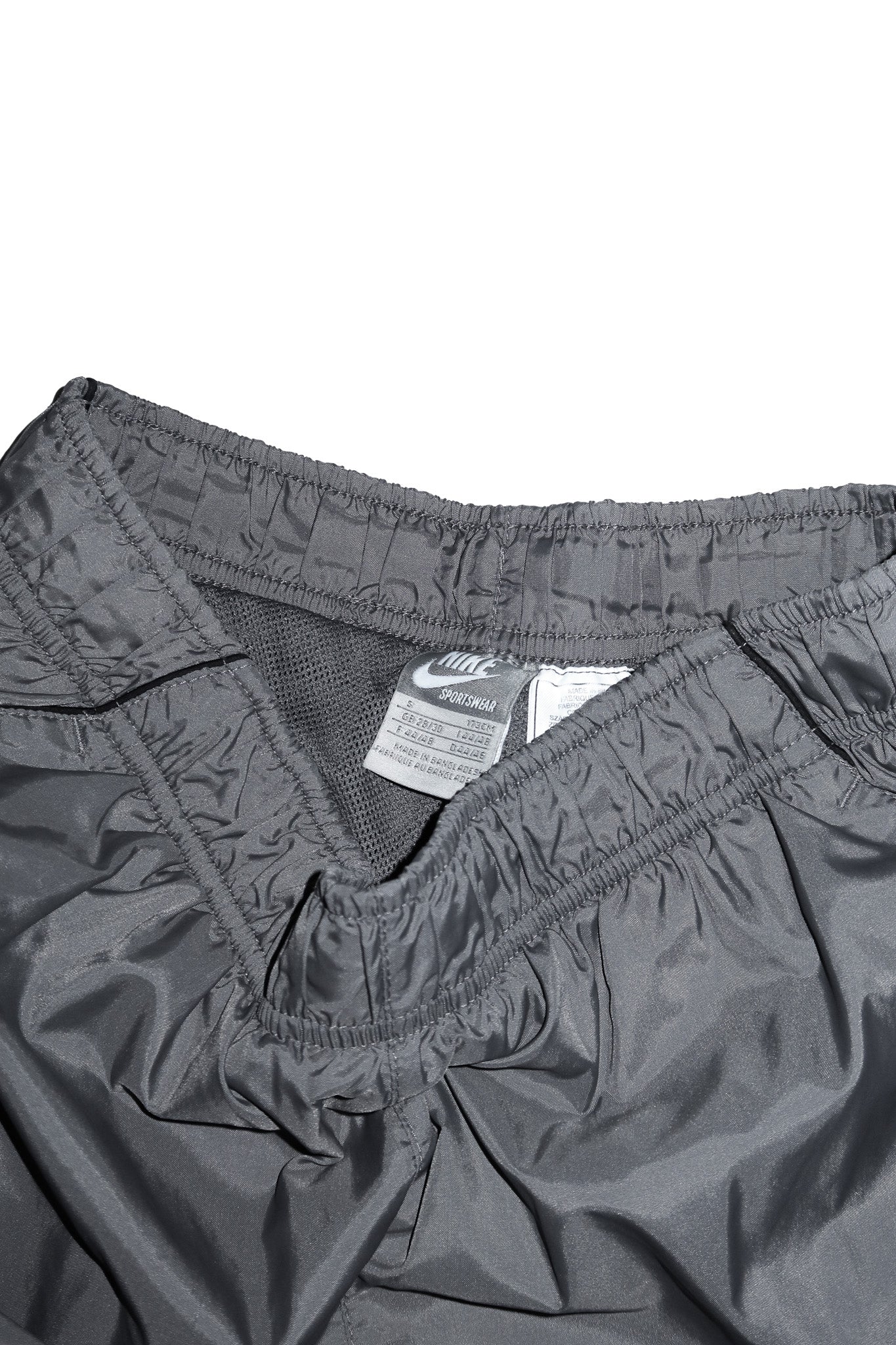 2000’s nike sportswear cut off track pants grey.