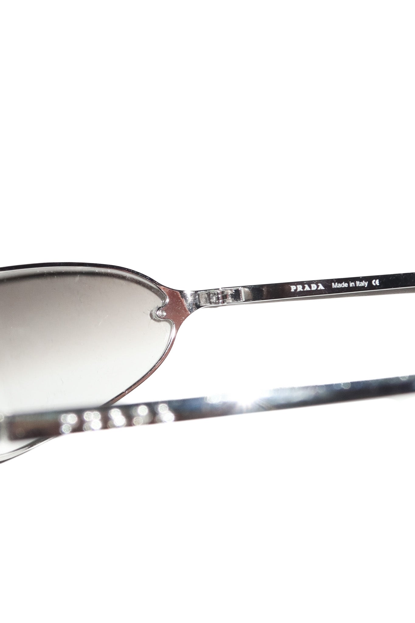 2000’s prada spr 56d rimless sunglasses silver.