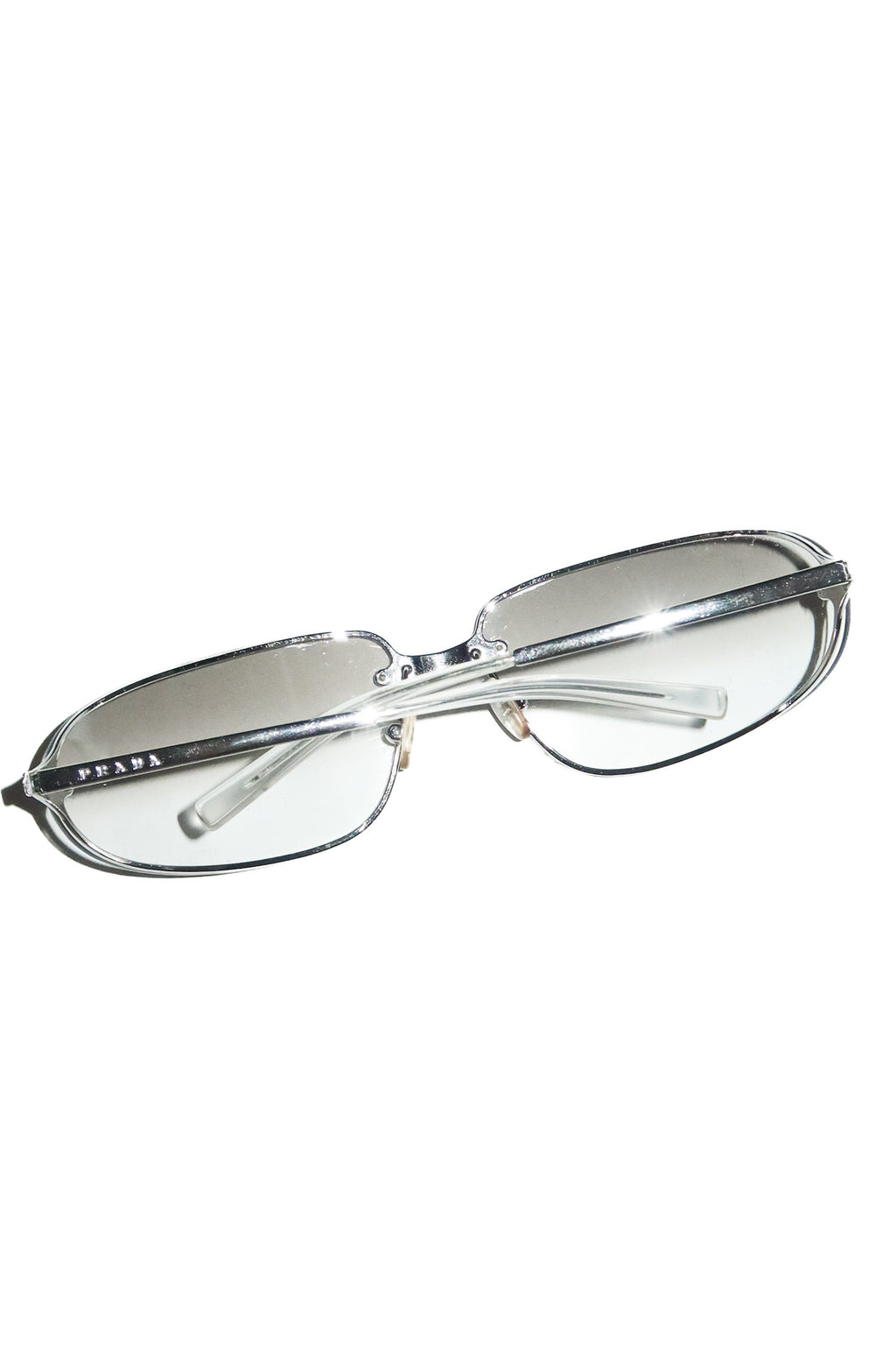 2000’s prada spr 56d rimless sunglasses silver.