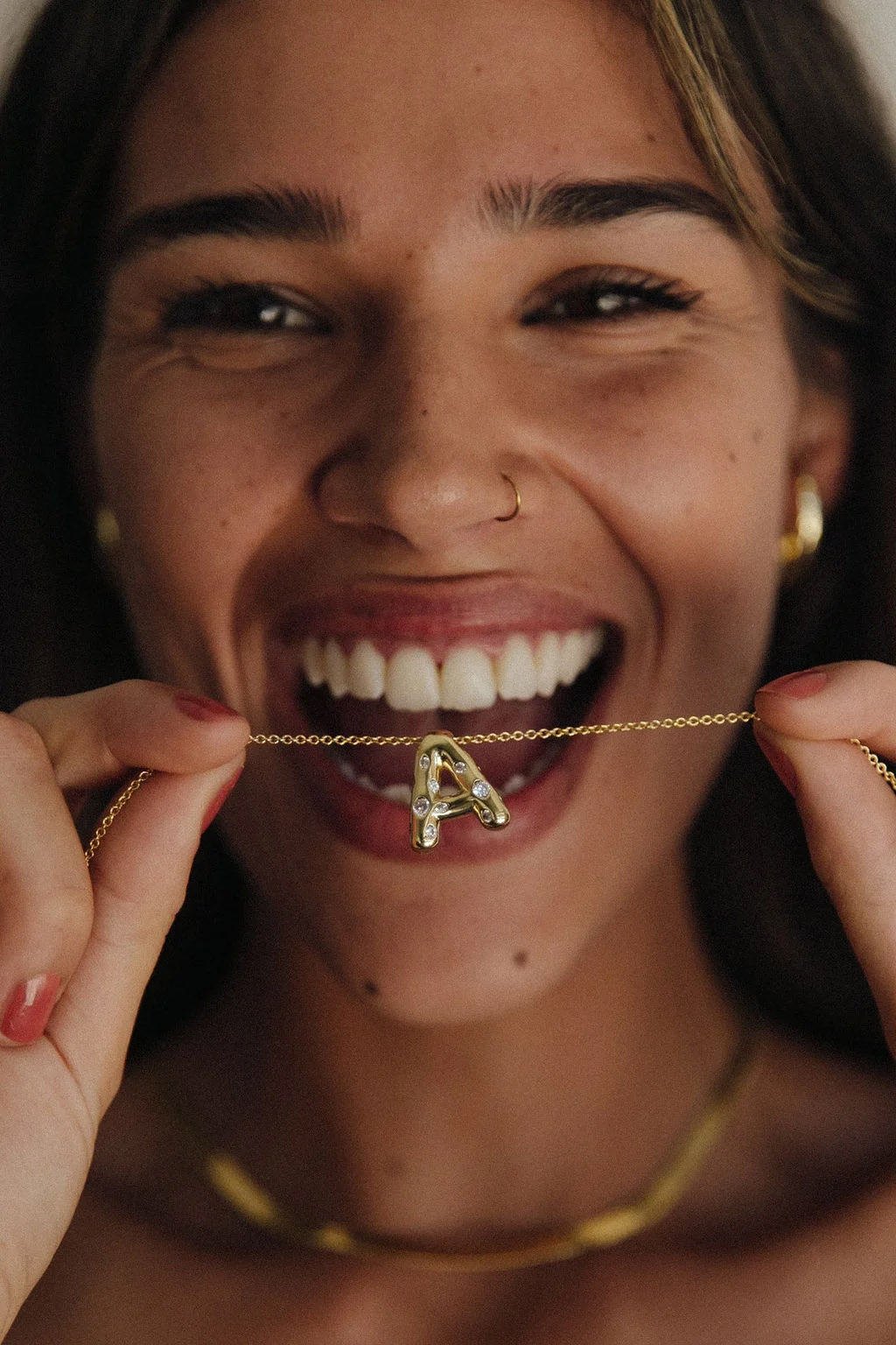sprinkle letter necklace.